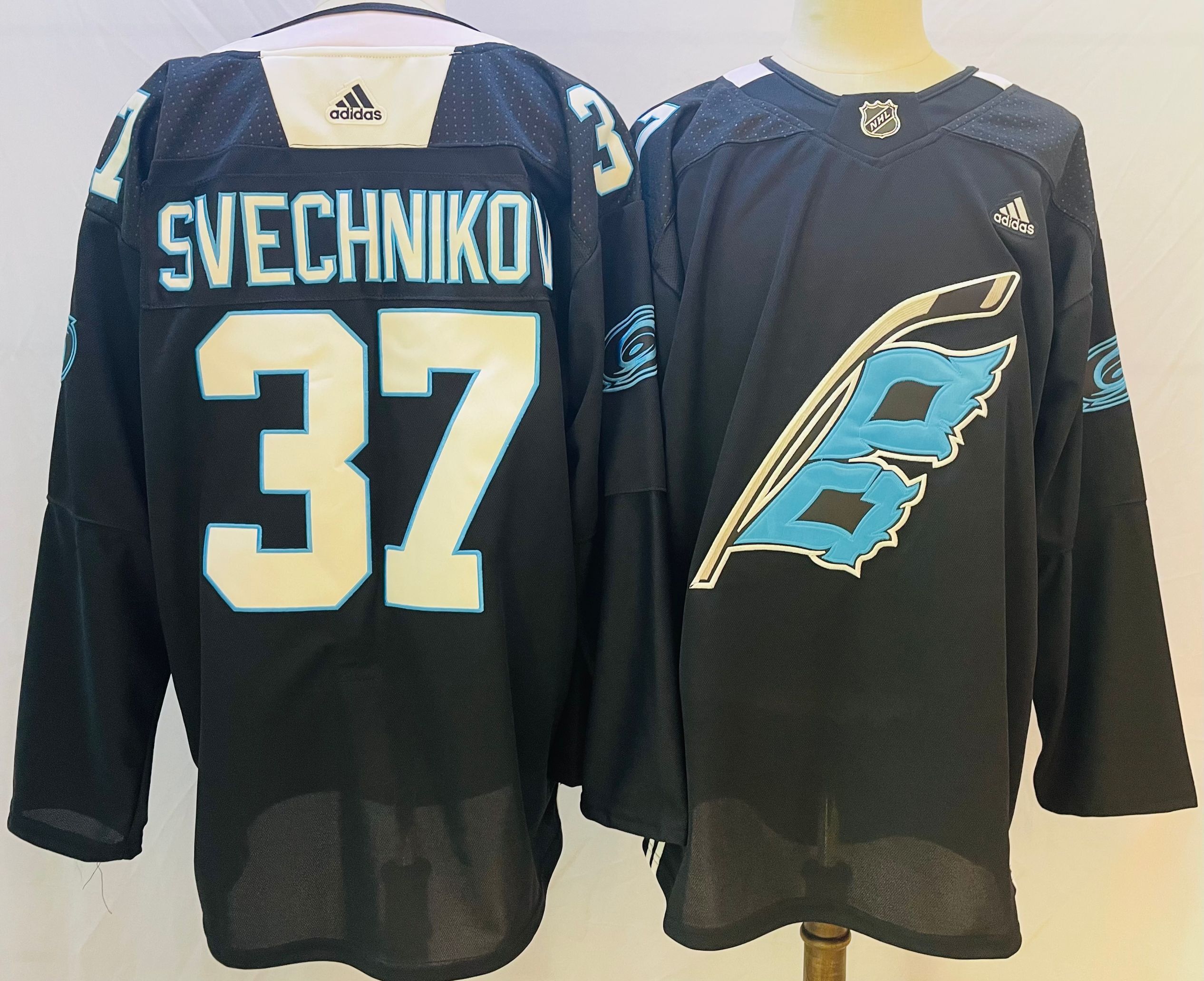 Men Carolina Hurricanes #37 Svechniko Black Authentic Stitched 2022 Adidas NHL Jersey
